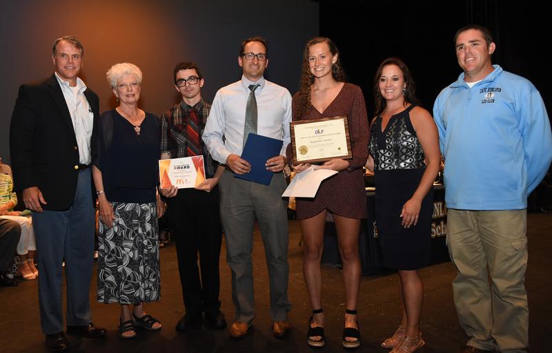 Jackie Cannon, center, is shown with (l-r) Cape Superintendent Bob Fulton, Janet McCarty of the James A. McCarty Memorial Scholarship, Brandon Holston of McDonald’s, Mike DiPaolo of Delaware Community Foundation, Cape Principal Nikki Miller and Mike Connors of Cape Leo Club.